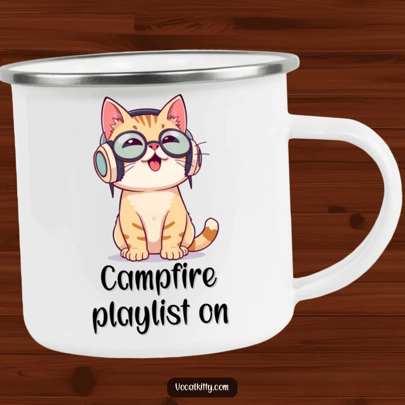 Funny camping mug with a cat wearing large headphones, enthusiastically bobbing its head to music, perfect for outdoor jams.