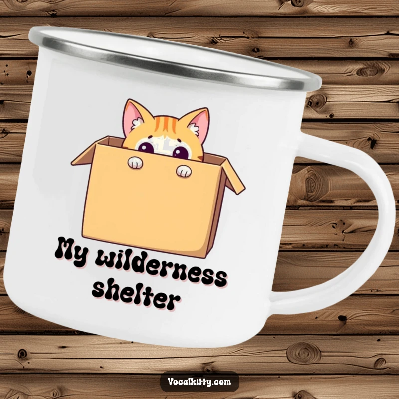 Funny cat camping mug showing a curious feline character peeking out from a large cardboard box, ideal for humorous outdoor use.