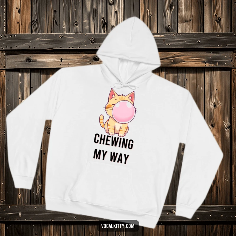 Funny cat hoodie featuring a playful kitten blowing a spectacular, shimmering bubble gum bubble, radiating pure joy and silliness.