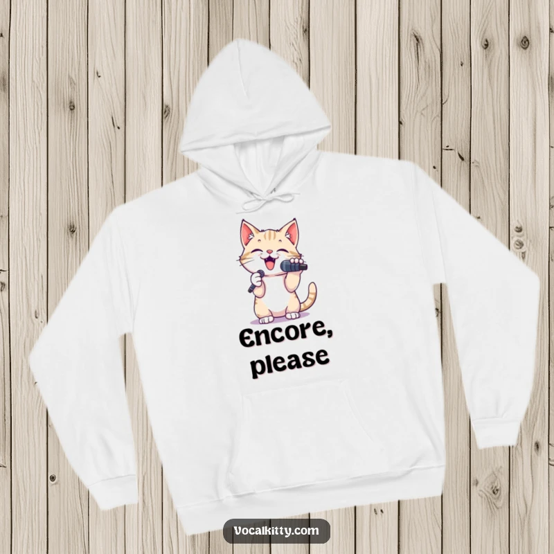 Funny hoodie featuring a small cat holding a microphone, paws raised mid-performance, delivering humorous musical energy.