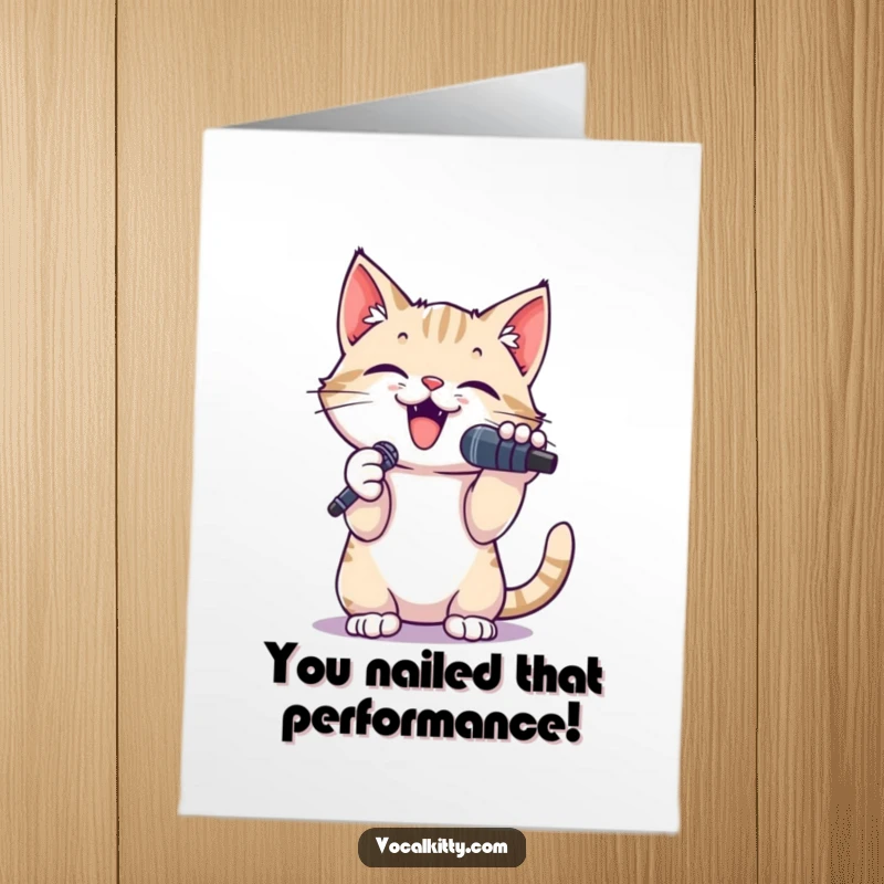 Funny Free Printable Congrats Card: Small cat with a microphone, belting a song with paws up, celebrating a big win.
