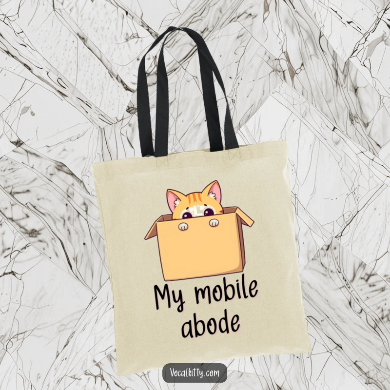 Funny cat tote bag with a curious character peeking out from a large cardboard box, a humorous and practical accessory.