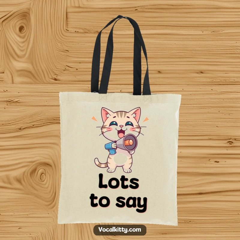 Funny cat character with a tiny megaphone, radiating boisterous enthusiasm, on a tote bag, promoting fun.